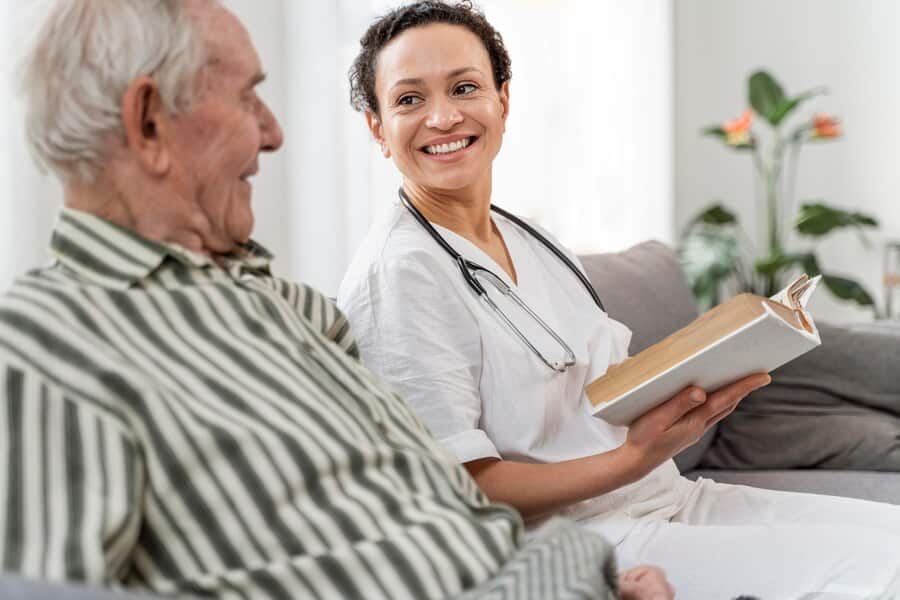 senior and caregiver having a communication about  senior assisted living services